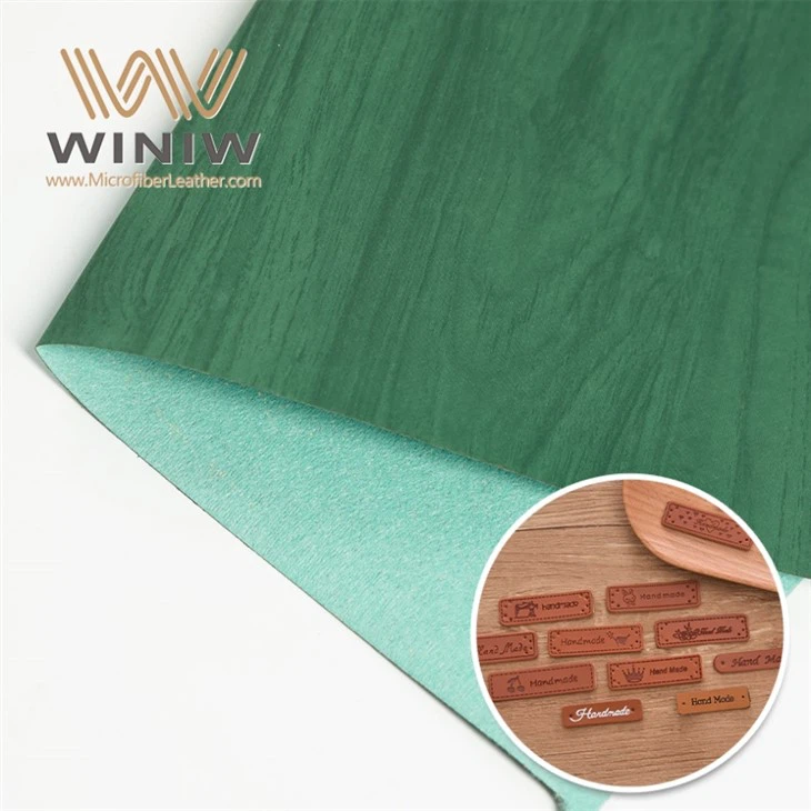 PU লেবেলের জন্য অ্যান্টি ফাউলিং সিন্থেটিক পিইউ লেদার ইমিটেশন ফ্যাব্রিক